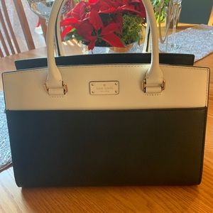 Brand New Kate Spade with tags. Black and Beige